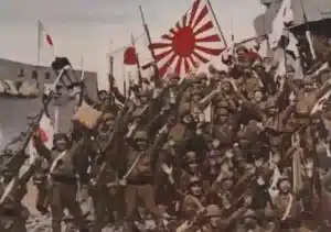 Japanese soldier with flags in December 1937, Nanjing, China.