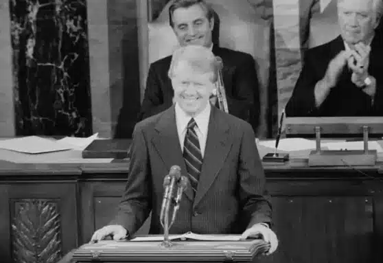 The image shows President Jimmy Carter addressing a Joint Session of Congress on January 23, 1980, where he articulated the Carter Doctrine and its significance for U.S. foreign policy.