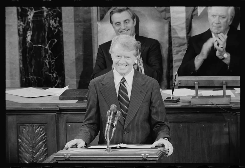 The image shows President Jimmy Carter addressing a Joint Session of Congress on January 23, 1980, where he articulated the Carter Doctrine and its significance for U.S. foreign policy.